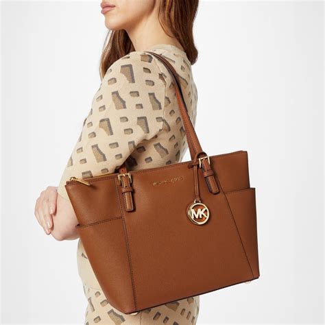 michael michael kors jet set macbook travel tote amazon|michael kors shoulder tote.